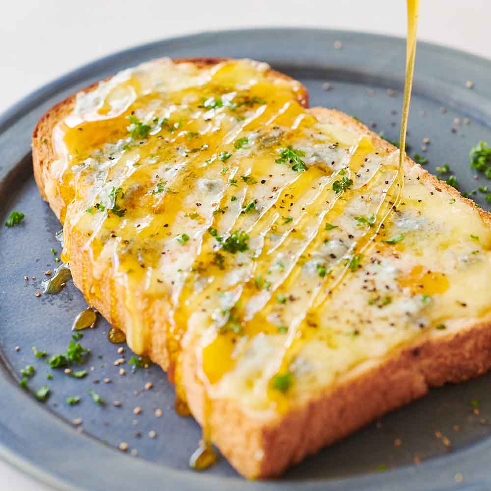 Cheese toast drizzled with Manuka Honey